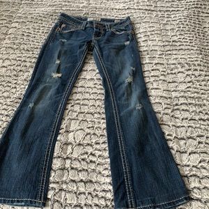 Women’s like new boot cut/flare, mildly distressed Miss Me jeans. 25/32.